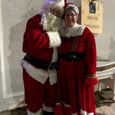 Santa and Mrs. Claus, aka Santa's helpers/SCPA volunteers, bringing Christmas Cheer to Chase Co!