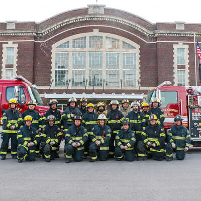 The volunteer fire department chose the majestic Hall as the background for their annual photo.