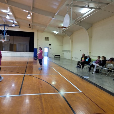 CCOSDD gymnasium showing refinished floors and pickleball lines